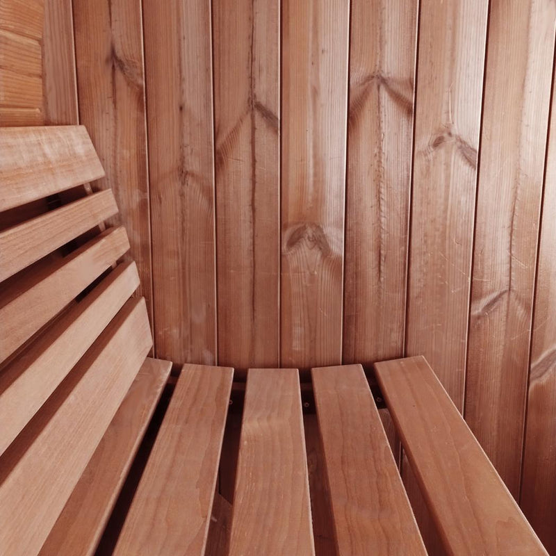 Close-up of the wooden bench backrest inside the SaunaLife Model E7 outdoor barrel sauna.