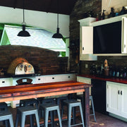 HPC Villa Series glass tile pizza oven built into a covered outdoor kitchen
