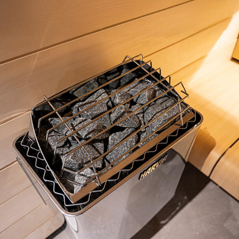 Harvia KIP60W electric sauna heater with control panel and heating elements for home sauna installation.