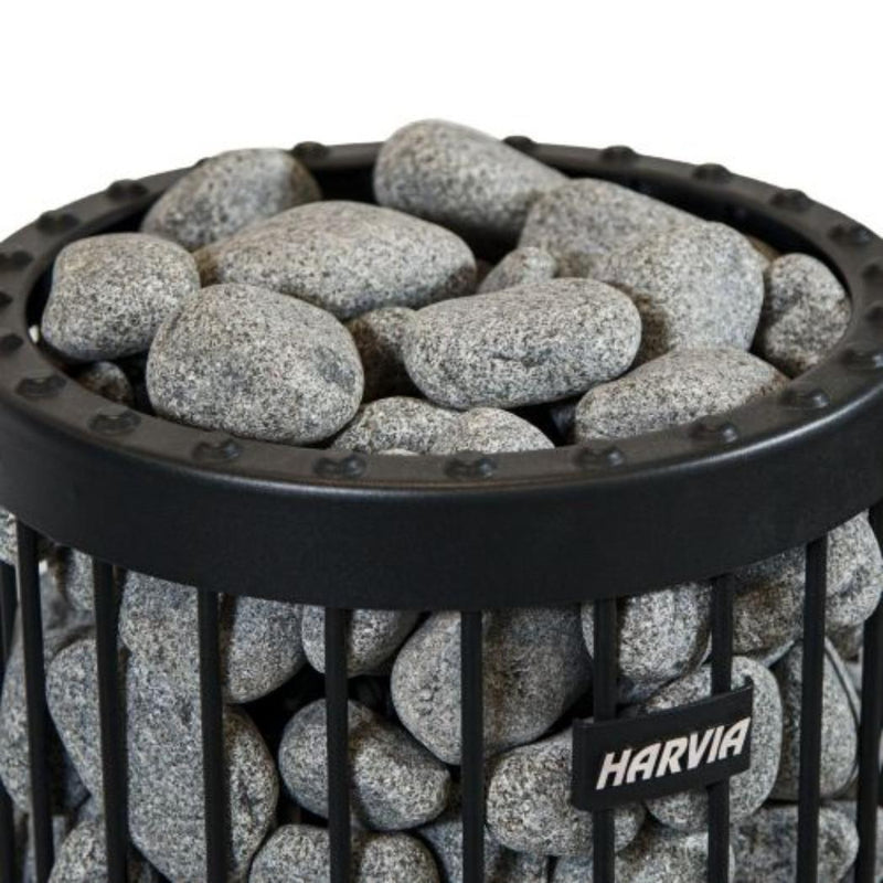 Harvia R-991 sauna heater stones in a basket, ready for installation in a traditional sauna heater system.