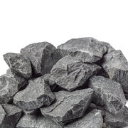 Harvia AC3000 sauna heater stones arranged in a pile, ready for installation in a sauna heater for optimal heat distribution.