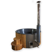 SaunaLife S4N wood-fired hot tub with integrated stove, chimney, and steps
