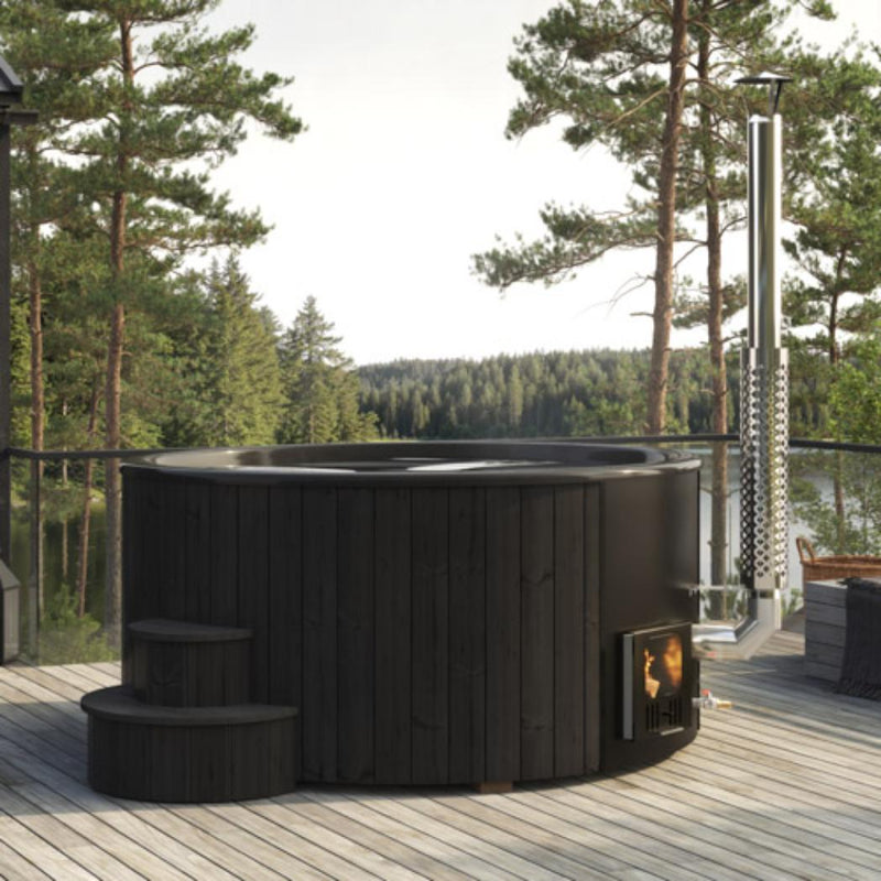 SaunaLife Model S6B wood burning hot tub with wooden exterior and open seating area, set outdoors for relaxation.