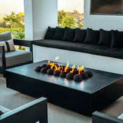 Cabo linear powder coat fire pit on a covered patio