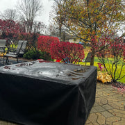 Canvas cover installed on a fire pit outdoors