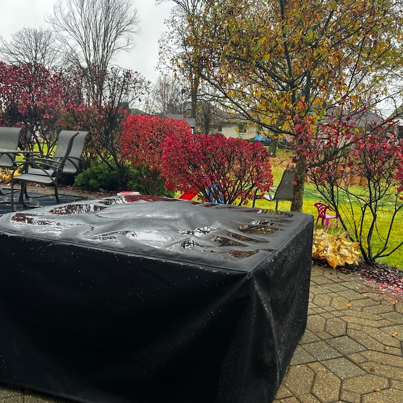 Canvas cover installed on a fire pit outdoors