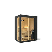 Kohler C1 small 2-person indoor sauna in Graphite Grey, three-quarter view with glass front and spruce interior