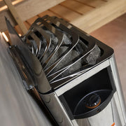 Harvia The Wall SWS80 sauna heater with digital controls, mounted on a wall, featuring a sleek black design and heating stones inside.