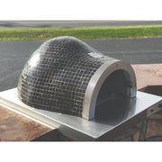 HPC Villa Series dual fuel wood and gas pizza oven with glass tile exterior, outdoor cooking appliance in black onyx finish.